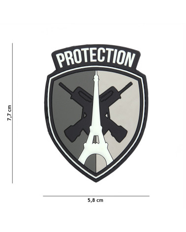 Patch 3D PVC PROTECTION gris de 101 INC fixé sur un gilet tactique