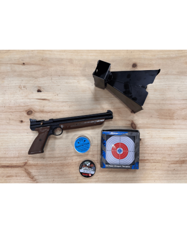 Pistolet American Classic à plomb calibre 4,5 mm vendu en lot avec trois boîtes de plomb dont une neuve, un porte-cible