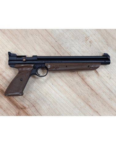 Pistolet American Classic à plomb calibre 4,5 mm vendu en lot avec trois boîtes de plomb dont une neuve, un porte-cible